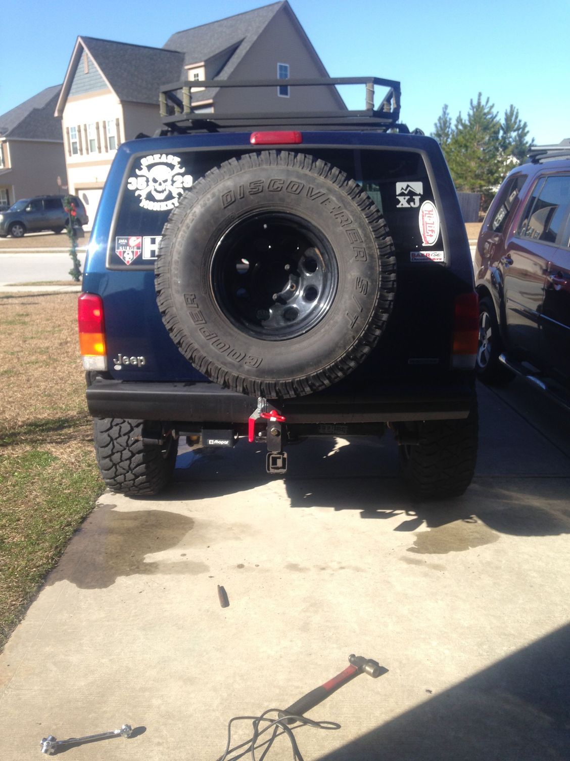 Fold down hitch tire carrier. Jeep Cherokee Forum