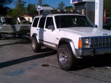 Here she is, a mostly stock 2wd Jeep... in all her chromed-out glory.