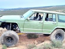 I run this thing in rocks trees willows these rails have kept the jeep looking decent. The 3/16 is denting and gougeing from rocks but makes hard stuff easy because i just slide over rocks and pivot off them around trees.
The fenders just cover 35x12.5 on 3.75 bs 15x8 wheels.

It would be some kinda bad dream to go back to wherling without fenders and sliders.  Nearly un bearable in wet conditions 