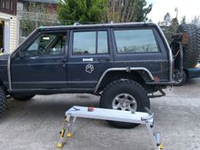 Then on to the rear wheel well hoops. The front of the hoop ties into my 2x6 (plus 1”) rock sliders. The rear into my rear bumper.