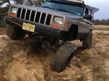Flexed out so I could pull the coil and install new bumpstops