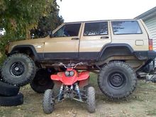 jeep flexed with quad under it... that quad paid for the stroker motor... well traded for the motor