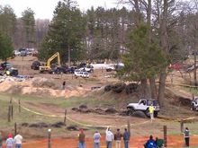 If you look closely, you can see the tires of the rolled over xj sticking up over the pipe in the background.