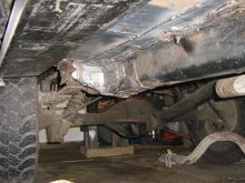 We can see the frame rail, rocker tube, flooring, and spring mount box.