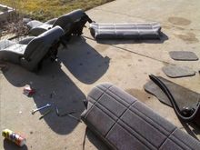 My neighbor has a '98 with a burned up engine. He's letting me take whatever parts I need!! I started with the seats, they've got a few stains but the foaming carpet cleaner cleaned em up decently.