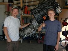 me and my dad infront of my newly rebuild engine and tranny!