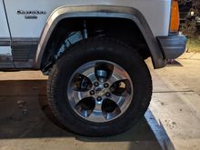 Stock wheels sit well in the fender well before I cut the fenders. 
These are off a 2016 wrangler Sahara I believe. 