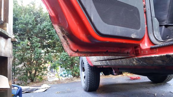 lower rear driver door has some rust that needs to be dealt with