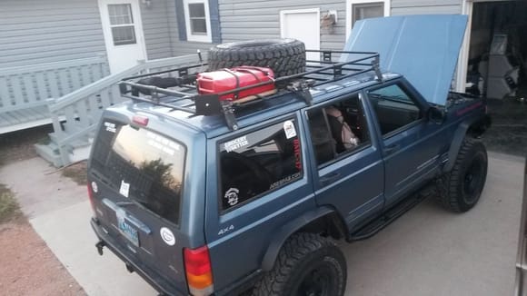 Jerry Can, HI-Lift, Axe, Spare on Roof Rack.
