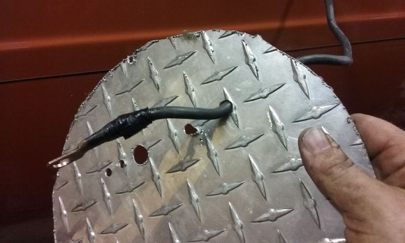 Thats just plain STUPID. You can get a grommet for under twenty five cents.