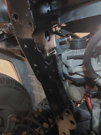 Inside and outside of the passenger side unibody rail...