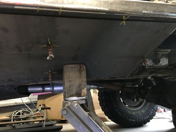 I used a jack to push the plate against the tie in