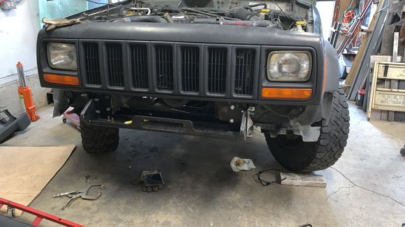 This Jeep had been involved in a head on type accident so fitting the mount was a challenge. After a bit of hammering, tweaking and cussing it fit 👍. The mount actually realigned  the frame area close to factory spec.