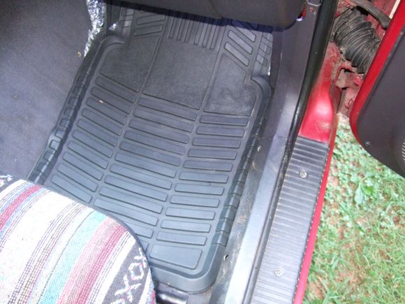 Passenger side.  The foil sticking out under the top left corner is foil/bubble/foil insulation.  Eventually it will go under the carpet if I find a reason to pull it up again after tracking down the leaks.