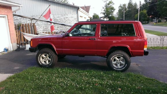 Back from paint. New rockers, fenders, door skins and 1/4 panels put on. Long wait.