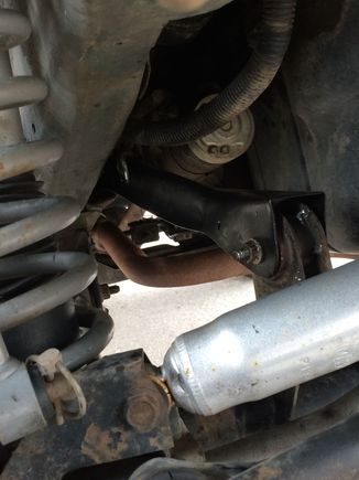 New passenger side upper control arm (Factory) and axle bushing (Crown).