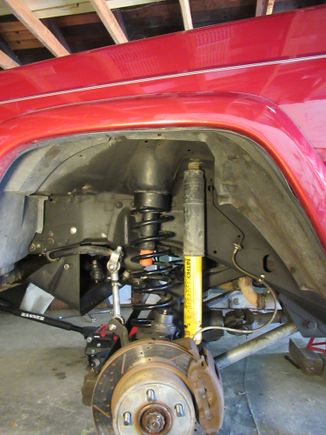OME front spring with 1-1/2" seat/spacer to net a 3-1/4" lift that matches the full pack lift on the back 
