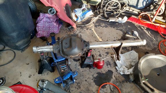 Driver Inner-C... Removed
Flap disk clean up tubes... Done
Gear oil and metal dust it's everywhere and the Mrs is not to Ken on the garage smelling as such.
Time to measure and cut the 3", .25" wall DOM tubes I'll be outer sleeving this puppy with... More on that in a few days.