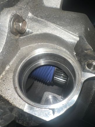 A view of the speedometer ring gear on the tail shaft of the transfer case. A bit hard to tell here but I later realized the teeth were deformed. 