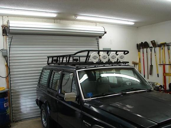 Finished rack after spraying with bedliner and mounting lights.  Still have to finish running wire inside and wire switches for lights.