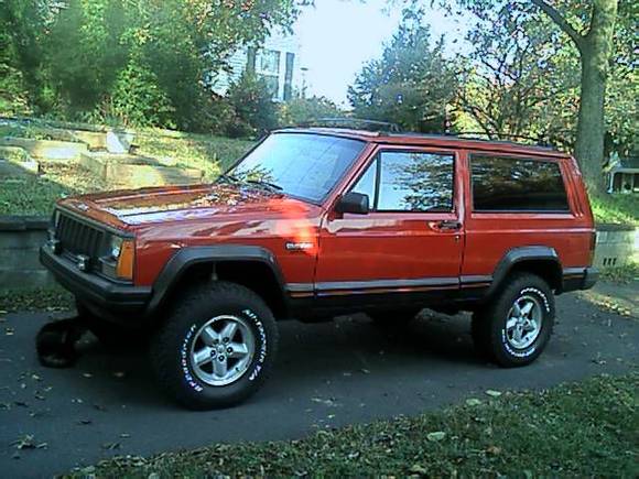 My 95 after the Rusty's lift and stealing the wheels off the son's Grand...