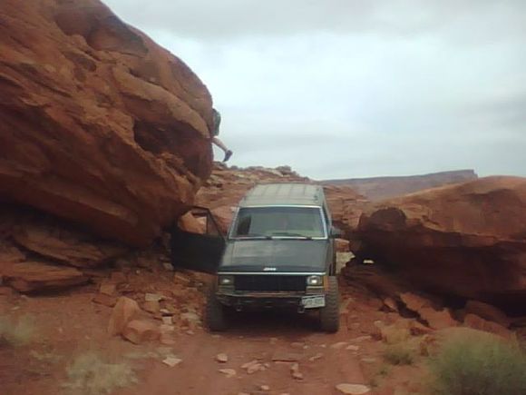 crawling between 2 big boulders
