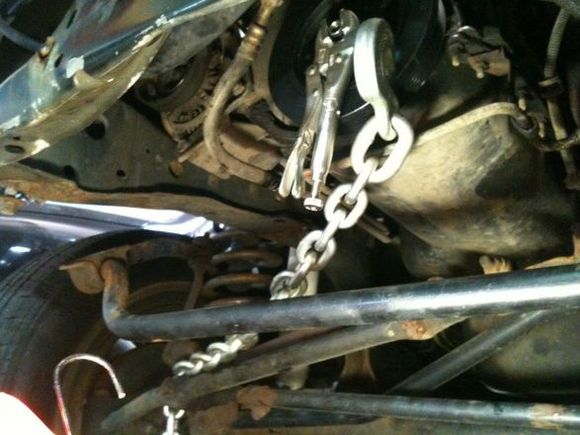 Like i said the chains came in handy i had to use the chains and vise grips to help break loose the adapter. Tadah!.. yes i know my cross member is F'd up i got the bright idea of having my buddy pull from that particular spot when i was stuck bad idea....