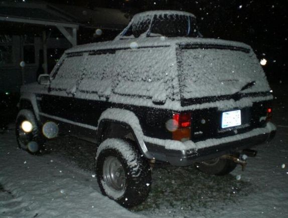 CIMG1662 1
My XJ during rare snow storm. Dec. '08.