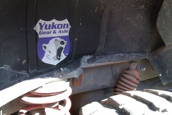 12'' rock made it's way into fender tubb ,now the  inside of the jeep is 3'' smaller