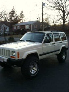 32 in x 11.5 in goodrich a/t tires with 15x8 in mickey thompson wheels