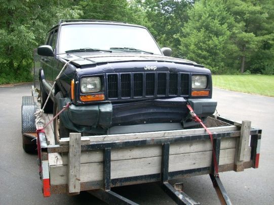 Purple Jeep on first day home... Blew both bags with this hit! They have been replaced now. Have $1500 total into it. Have driven it a year with no issues. 132,000 on it now. Another Craigslist buy.