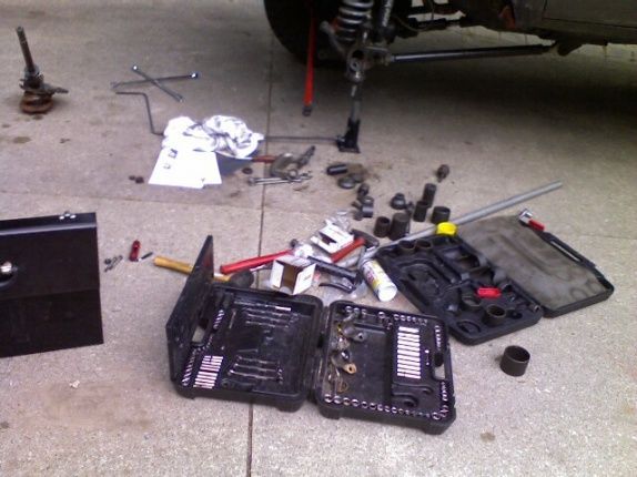 all the tools sprawled out for the ball joint replacement