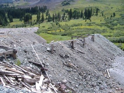 Imogene Pass, Upper Camp Bird Number 3 Level
Remains of an ore cart trestle. The tailing piles covered huge areas of the basin.