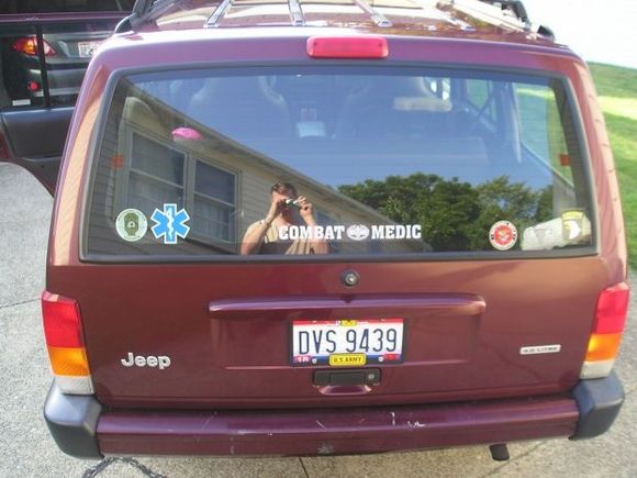 My girl showing off her badges. LOL