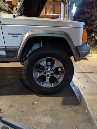 Stock wheels sit well in the fender well before I cut the fenders. 
These are off a 2016 wrangler Sahara I believe. 