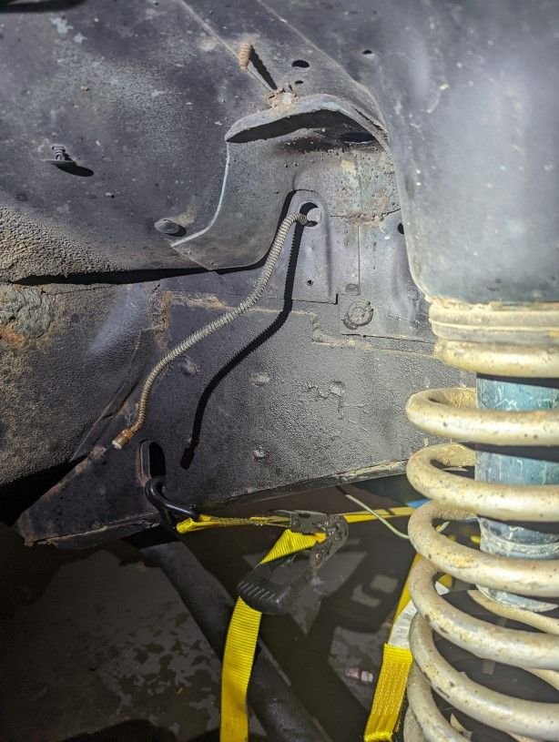 Where's the other end of the front passenger brake line? Jeep