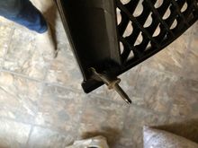 The broken flimsy mounting point