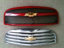Top grille in red is an SS grille 
Bottom chrome grille is LS/LT
