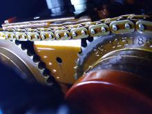 This is an example of a loose chain slapping against that upper guide, weakening the top plate and snapping it off. 