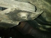 There might be room for the arm to move up to an inch when you step on the brake and it rotates upward 