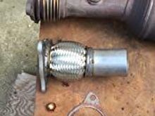 Weld or clamp on flex pipe 