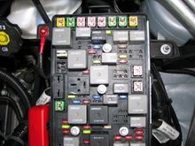 That red wire on that terminal at the upper left, see there, that’s the power to the power steering fuse and relay. 
Inspect there if there is more then one wire, that is a problem. 