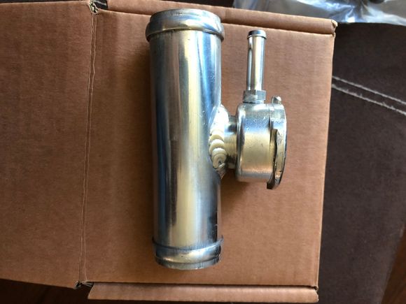 Nicely welded and the rad cap attaching points are machined not cast 