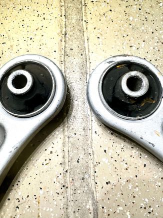 One bushing has broke loose, the other is badly worn.