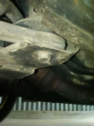 There might be room for the arm to move up to an inch when you step on the brake and it rotates upward 