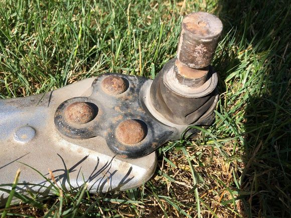 Take you angle grinder and grind these rivets on the ball joint side flat. Then centre punch them and drill 1/8 hole straight down they them , then 1/4 then 5/16. Drill the heads off with a 1/2 drill bit just until the head pops off
Knock the ball joint off the lac and then drive the remaining part of the rivet out of the LCA. 