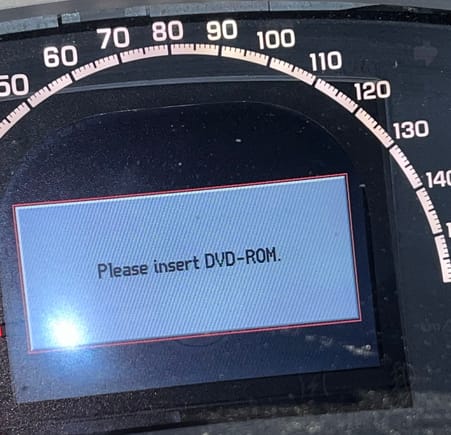 What The screen says now, even though the DVD-ROM is in the navigation DVD player. Holding cancel will turn it off every time I start my car, but as soon as I turned my car off and start it again, the notification will pop up again. 