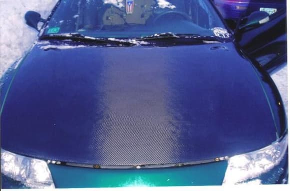 Carbon fiber hood before i painted green and clear coated
