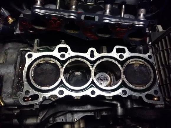 about 17 years of build up on pistons...explains a lot