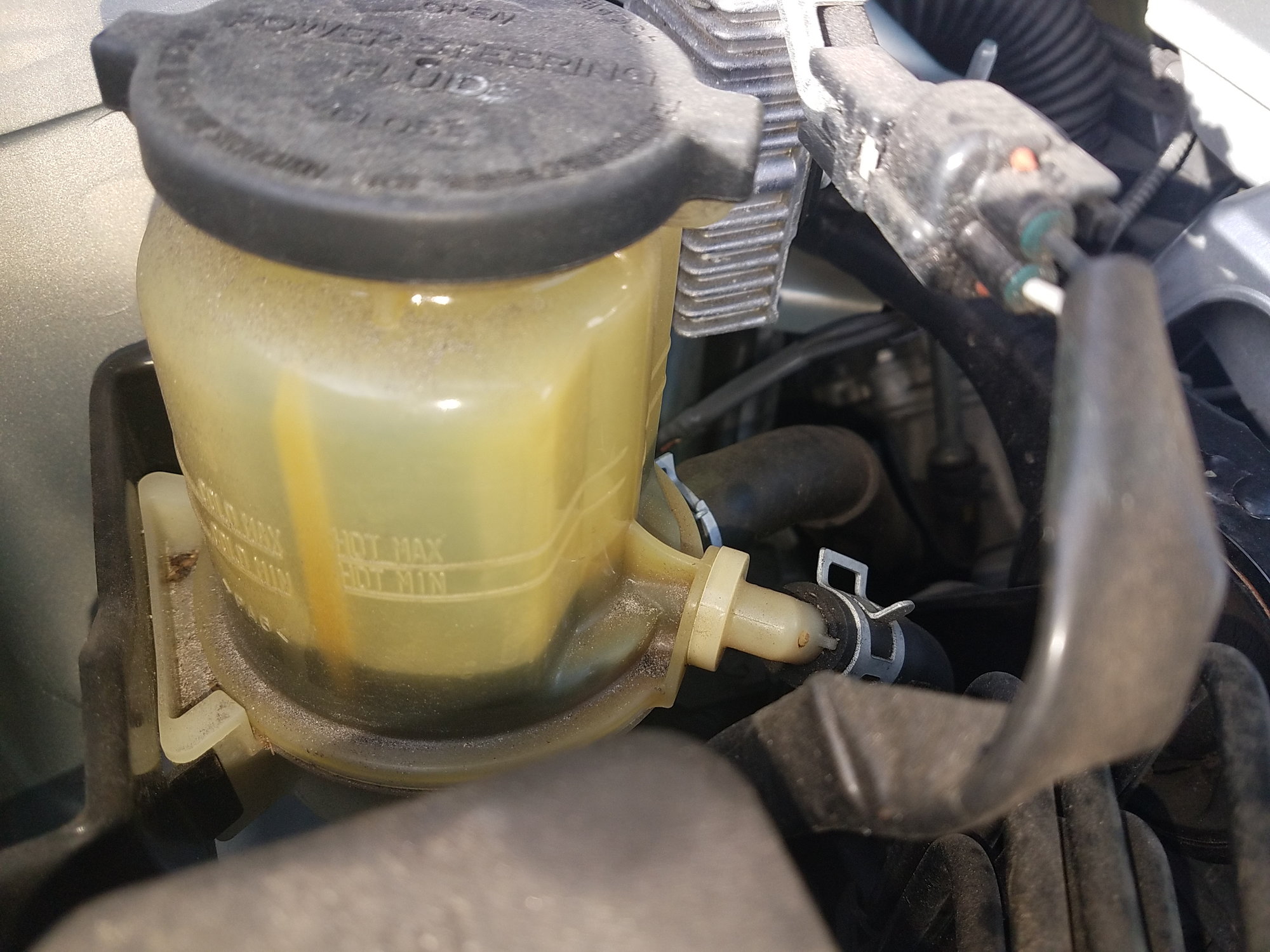 power steering fluid leak symptoms